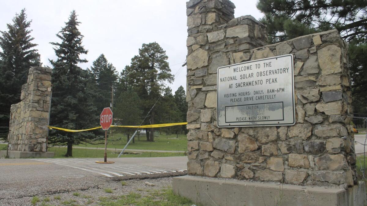 The entrance to Sunspot Observatory is blocked near Alamogordo, N.M., on Friday.