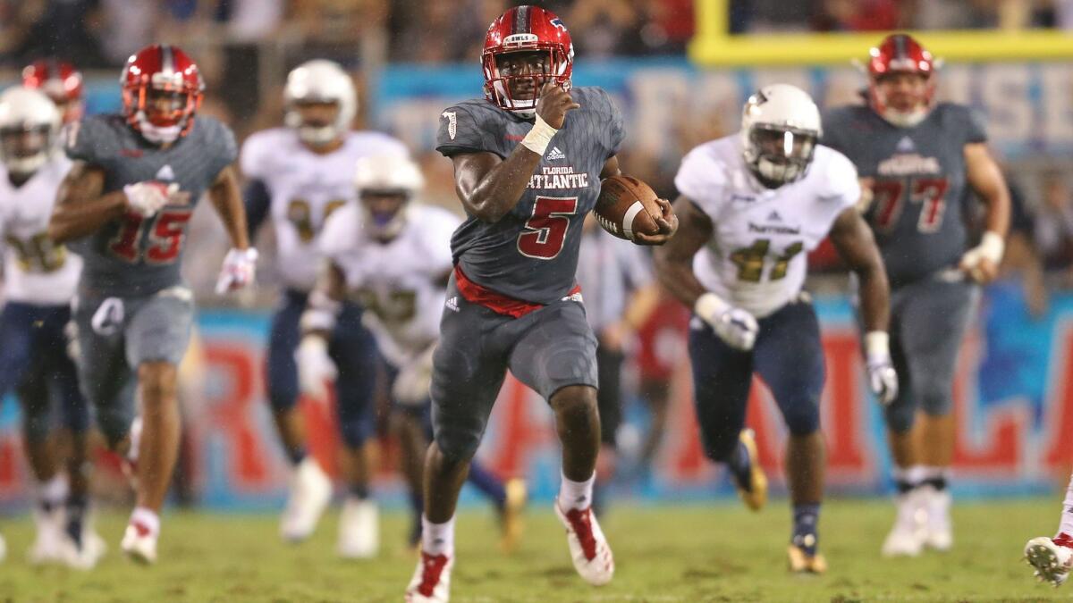 Florida Atlantic's Devin Singletary leads the nation in rushing touchdowns (26) and set a team single-season rushing record (1,632).