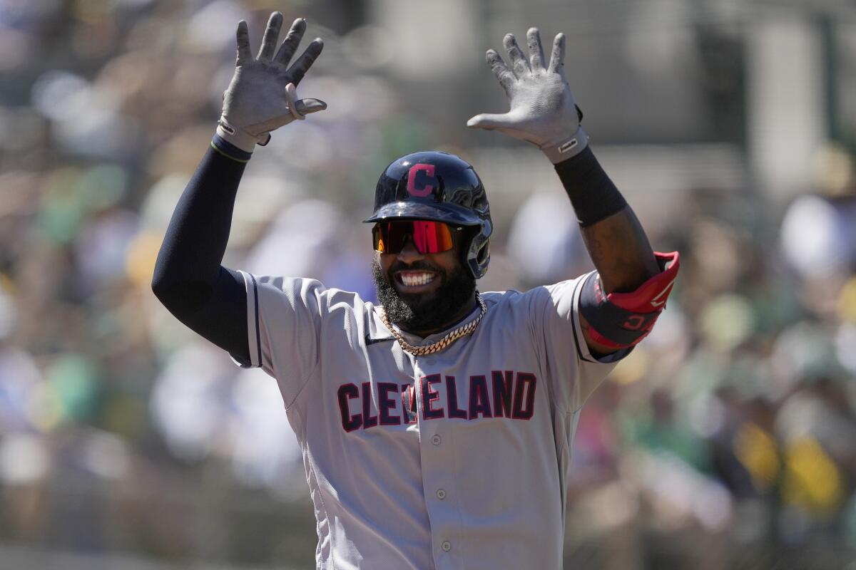 Cleveland Indians' Franmil Reyes celebrates after hitting a home run against the Oakland Athletics during the eighth inning of a baseball game Saturday, July 17, 2021, in Oakland, Calif. (AP Photo/Tony Avelar)