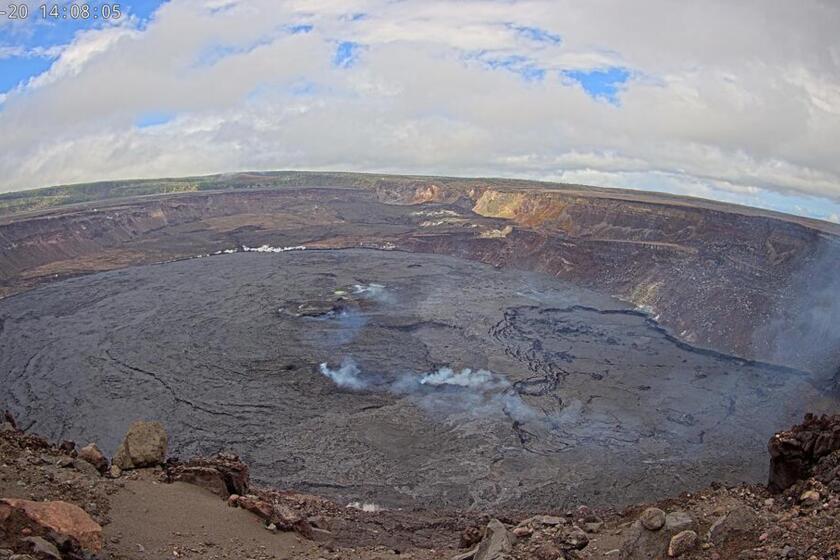 This webcam image provided by the U.S. Geological Survey shows the summit of the Kilauea volcano in Hawaii, Tuesday, June 20, 2023. An eruption of the Hawaii volcano that began nearly two weeks earlier has come to a pause, scientists said. Kilauea, one of the most active volcanoes in the world, began erupting June 7 after a three-month pause, displaying fountains of glowing red lava without threatening any communities or structures. (U.S. Geological Survey via AP)