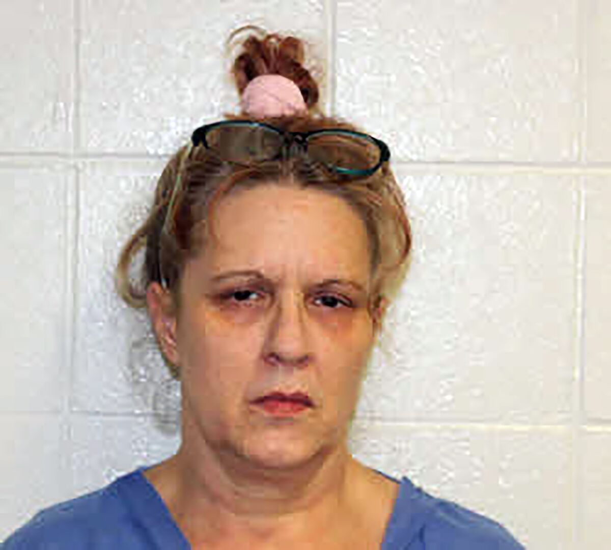 This image provided by the Avery County Sheriff’s Office shows Elizabeth Carserino. On Sunday, Aug. 8, 2021, Sheriff Kevin Frye announced that Carserino was taken into custody and charged with murder, identity theft, larceny of motor vehicle and financial card theft. Carserino was held at Avery County jail on secured bond of more than $1.6 million, the sheriff said. (Avery County Sheriff’s Office via AP)
