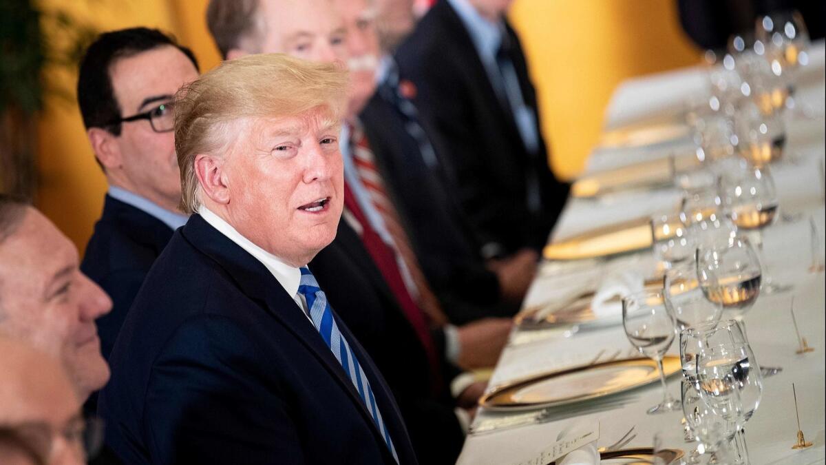 President Trump speaks before a dinner with Australia's Prime Minister Scott Morrison and others at the Imperial Hotel in Osaka, Japan, on Thursday.