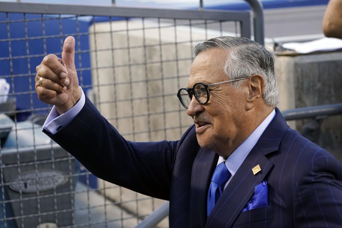 Dodgers Spanish language broadcaster Jaime Jarrin acknowledges the fans during a pregame ceremony.