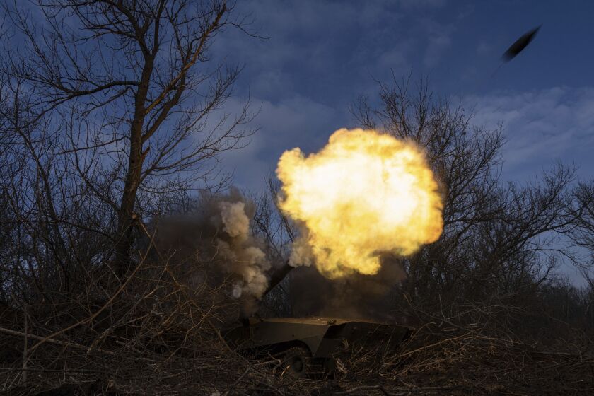 Ukrainian self propelled howitzer 2s1 of 80 Air Assault brigade fires towards Russian forces at the frontline near Bakhmut, Ukraine, Friday, March 10, 2023. (AP Photo/Evgeniy Maloletka)
