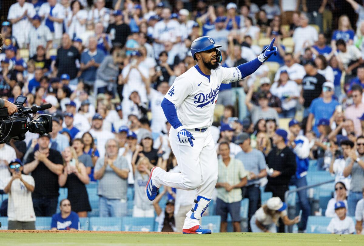 Dodgers outfielder Teoscar Hernández acknowledges the crowd after hitting a solo home run against the Diamondbacks on July 3.