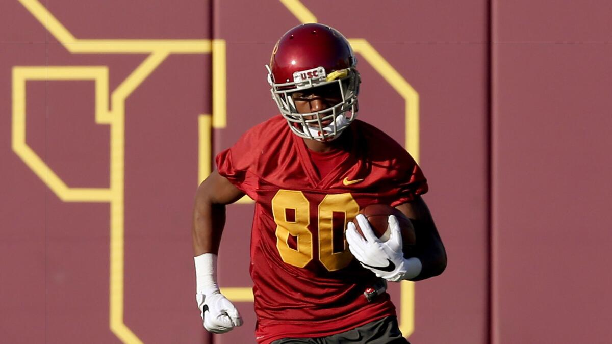 USC wide receiver Deontay Burnett runs through drills on the first day of spring practice at Howard Jones Field.