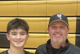 Sophomore guard Grant Shaw with his father, Oak Park coach Aaron Shaw.