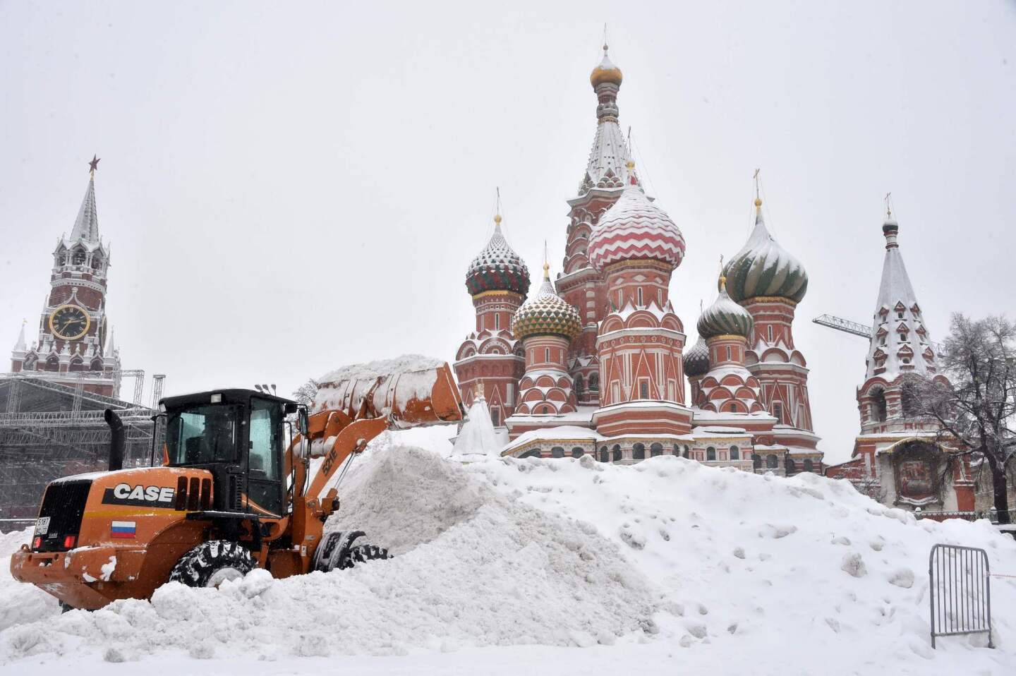 A bulldozer shovels snow from Red Square during a storm in Moscow on Feb. 4.