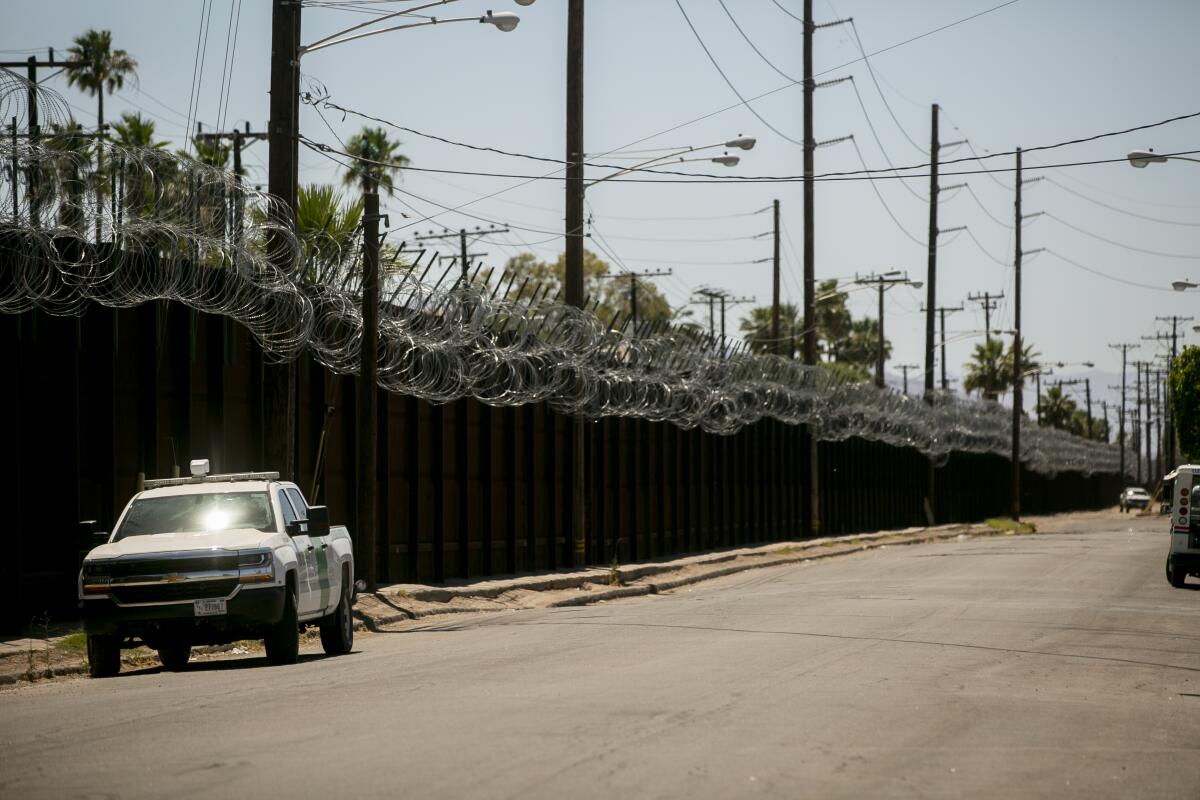 The El Centro Regional Medical Center, just miles from the Calexico/Mexicali border, receives an influx of COVID-19 patients.