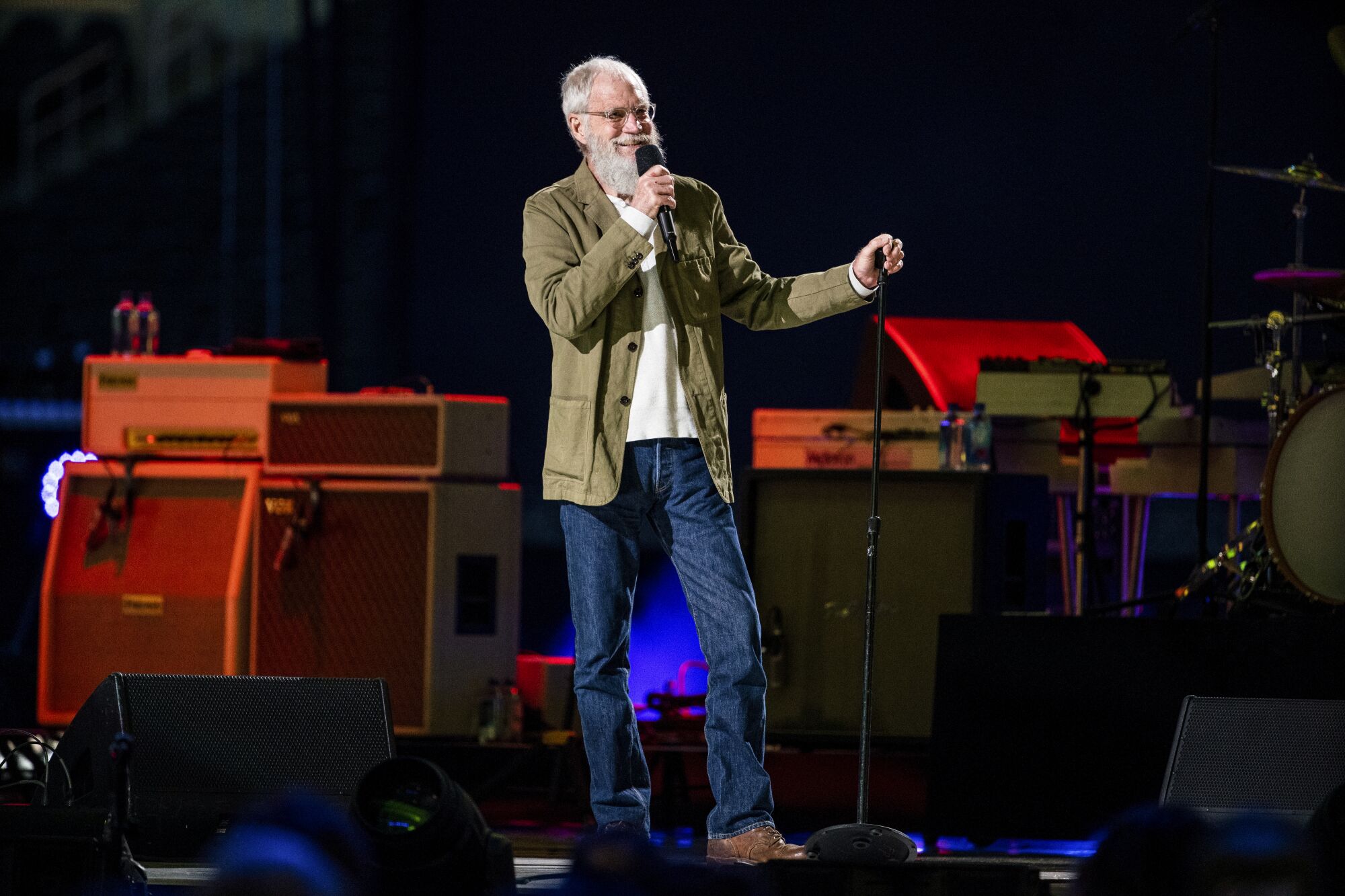 David Letterman speaks during the Vax Live concert