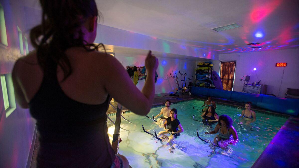 Aqua cycling class at Motion Plus Aquatic & Therapy Center. (Gina Ferazzi / Los Angeles Times)