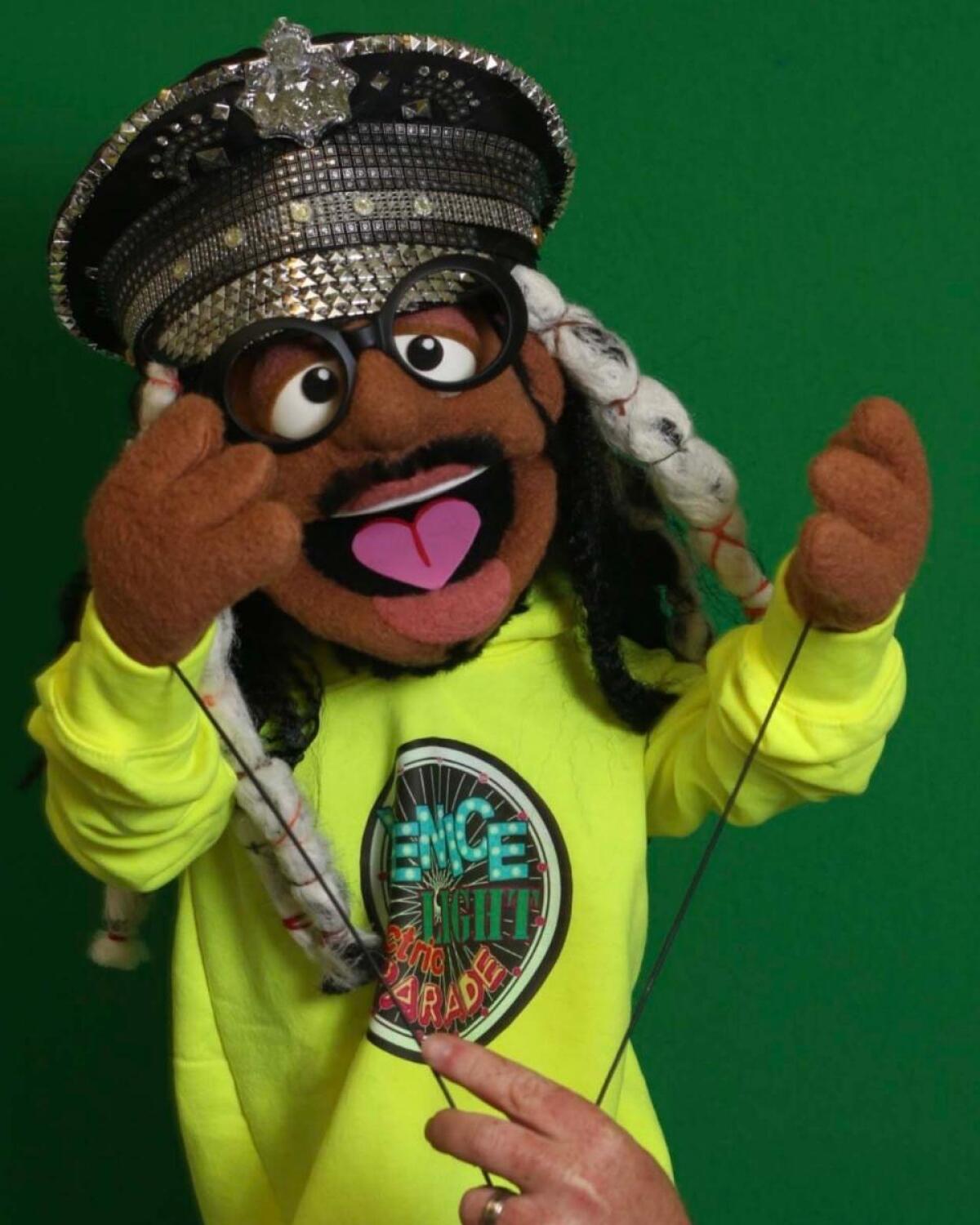 Marcus Gladney commissioned a Muppet-style puppet of himself to help promote the electric light parade on social media.