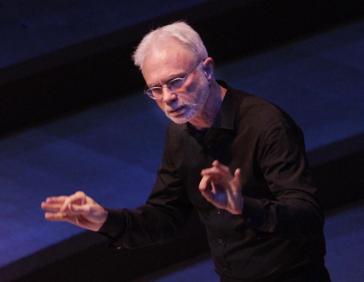 John Adams, shown conducting at Walt Disney Concert Hall in Los Angeles in April, has condemned the Metropolitan Opera's decision to cancel an upcoming cinematic broadcast of "The Death of Klinghoffer."