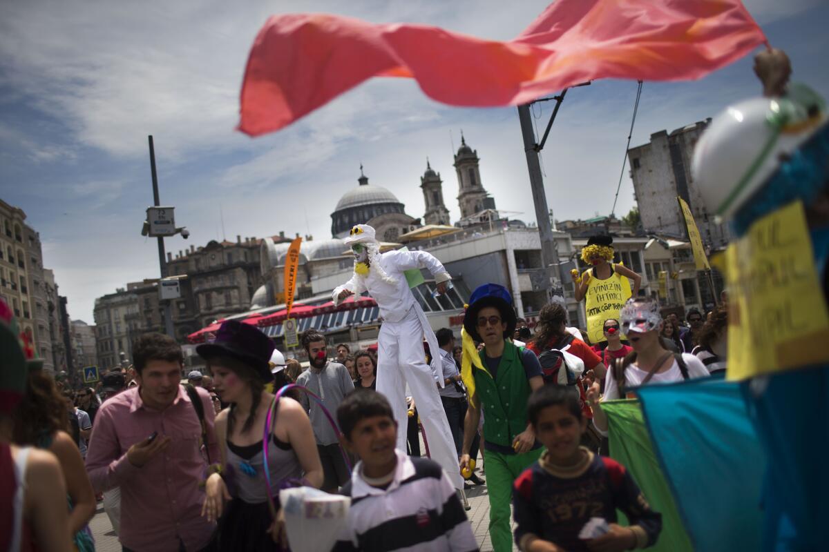 A Turkish art group performs in support of protesters at Taksim Square.
