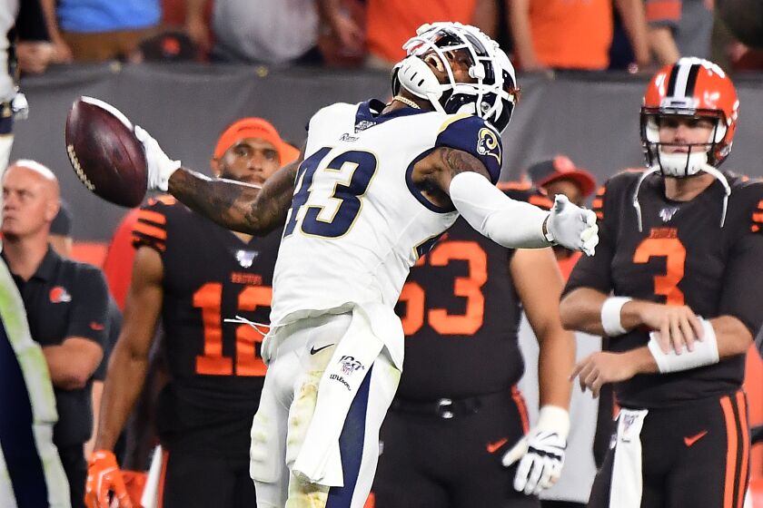 CLEVELAND, OHIO SEPTEMBER 22, 2019-Rams safety John Johnson celebrates his interception inthe end zone to seal the game against the Browns inthe 4th quarter at First Energy Stadium in Cleveland Sunday. (Wally Skalij/Los Angeles Times)