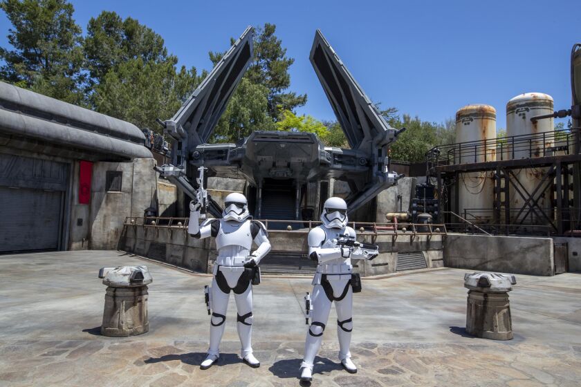 Storm Troopers patrol The First Order Outpost where the Tie Echelon fighter ship is parked at the Disneyland Resort in Anaheim.