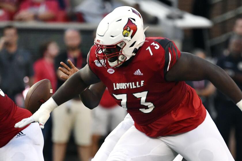 Louisville offensive lineman Mekhi Becton (73) in actionduring the first half of an NCAA college football game in Louisville, Ky., Saturday, Sept. 7, 2019. (AP Photo/Timothy D. Easley)