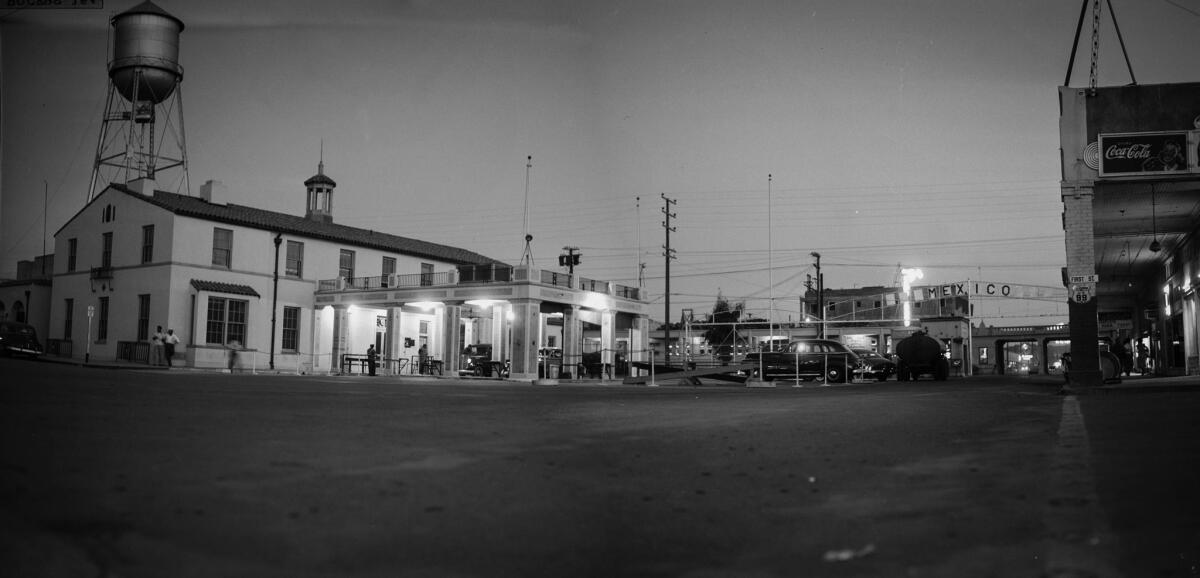 The border crossing at Mexicali-Calexico, between California and Mexico, appears quiet at dusk. This panorama, made from two photographs, appeared in the May 2, 1950, Los Angeles Times.