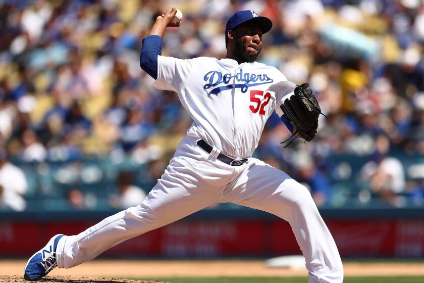 LOS ANGELES, CALIFORNIA - APRIL 17: Pedro Baez #52 of the Los Angeles Dodgers throws a pitch against the Cincinnati Reds during the eighth inning at Dodger Stadium on April 17, 2019 in Los Angeles, California. (Photo by Yong Teck Lim/Getty Images) ** OUTS - ELSENT, FPG, CM - OUTS * NM, PH, VA if sourced by CT, LA or MoD **