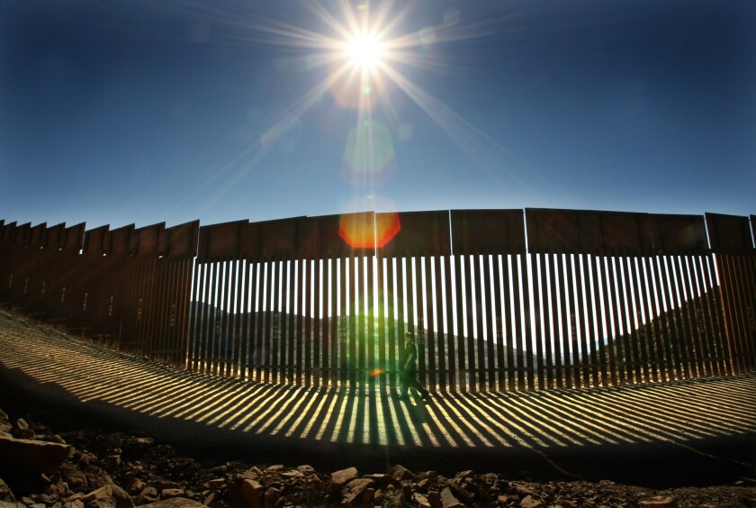 A portion of the U.S.-Mexico border fence at Otay Mountain, Calif.
