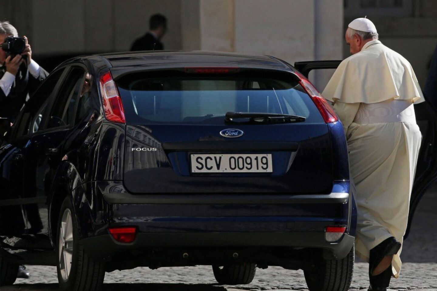 Pope Francis in a Ford Focus