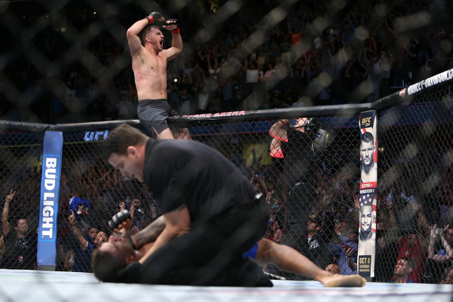 Stipe Miocic celebrates his victory over Alistair Overeem on Sept. 10 at UFC 203 in Cleveland.
