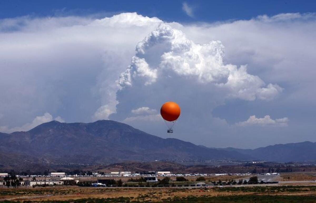 A balloon lifts visitors above the Orange County Great Park.