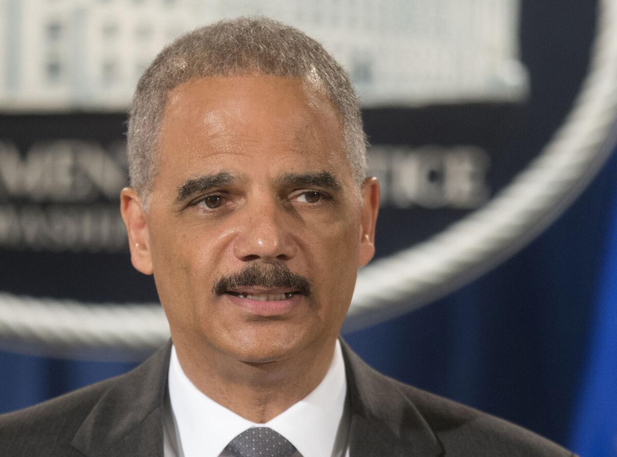 "I am deeply concerned that the deployment of military equipment and vehicles sends a conflicting message," Atty. Gen. Eric Holder said of the situation in Ferguson, Mo.