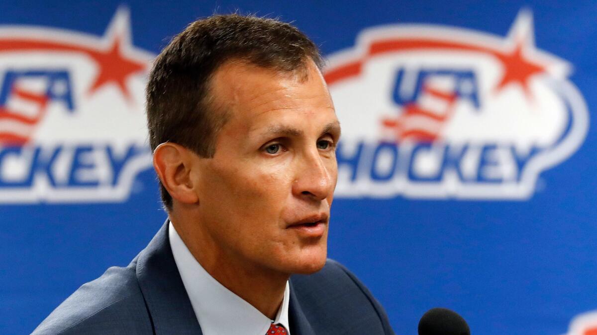 U.S. Olympic men's hockey coach Tony Granato speaks at a news conference.