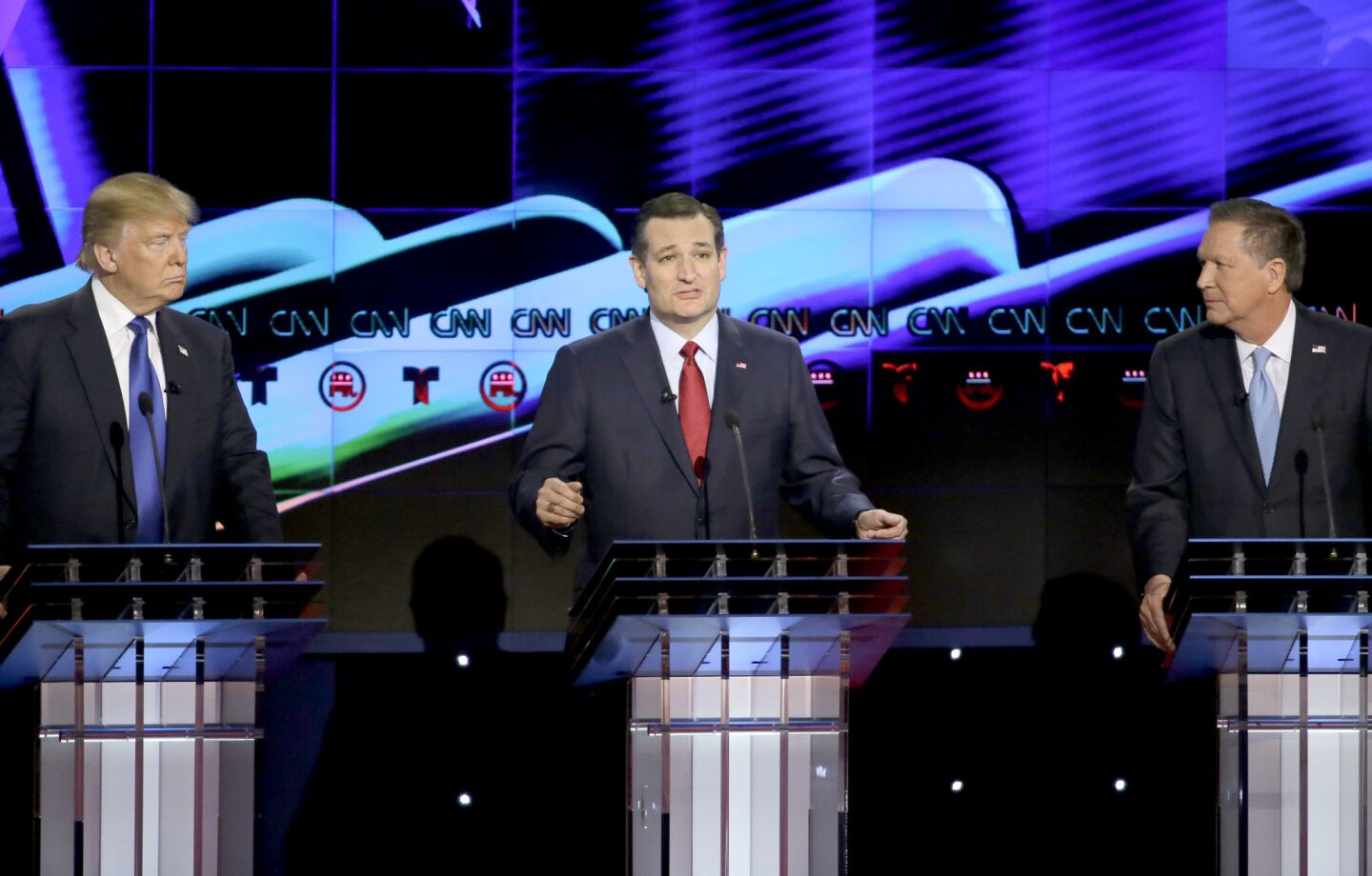 Donald Trump, left, Ted Cruz and John Kasich in the Republican debate.
