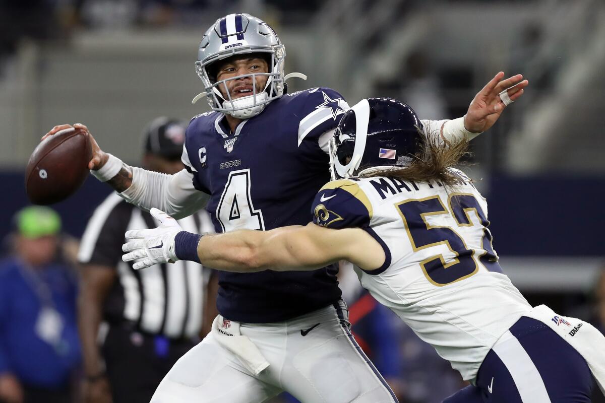 Dallas Cowboys quarterback Dak Prescott is hit by Rams linebacker Clay Matthews during the second quarter of the Cowboys' 44-21 win Sunday.