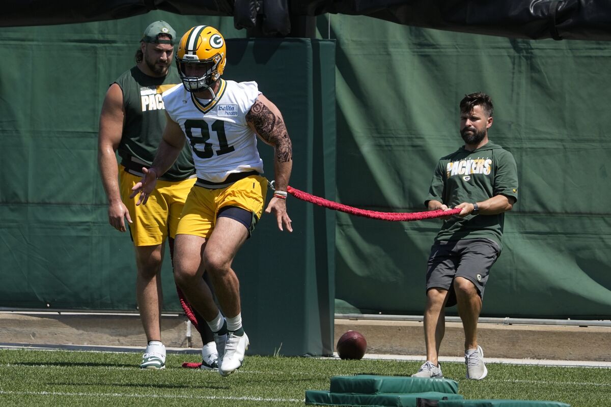 FILE - In this Tuesday, June 8, 2021 file photo, Green Bay Packers' Josiah Deguara runs a drill during an NFL football minicamp in Green Bay, Wis. Green Bay Packers tight end Josiah Deguara says his long recovery from a torn anterior cruciate ligament took a toll on him mentally as well as physically. (AP Photo/Morry Gash, File)
