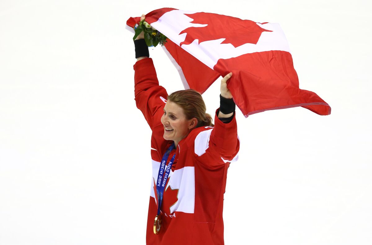 Canadian hockey player Hayley Wickenheiser at the Sochi 2014 Winter Olympics. In response to the International Olympic Committee's plan to proceed with the 2020 Summer Games, Wickenheiser said, “I think the IOC insisting this will move ahead, with such conviction, is insensitive and irresponsible given the state of humanity.”