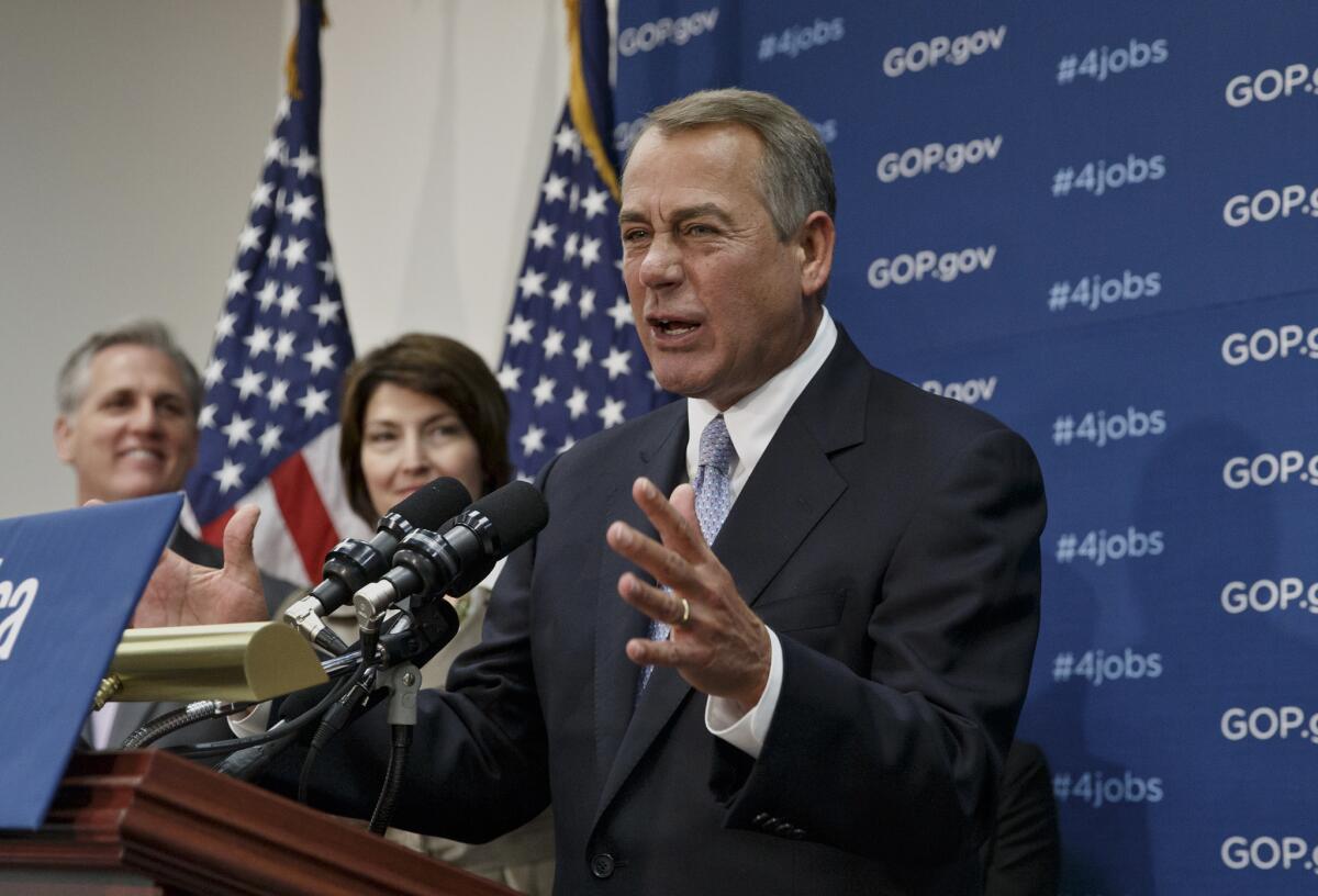 House Speaker John A. Boehner of Ohio speak to reporters on Capitol Hill.