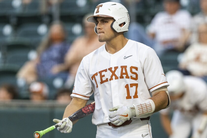 FILE - Texas first baseman Ivan Melendez walks to the batters box against Stephen F. Austin during an NCAA baseball game on Tuesday, April 12, 2022, in Austin, Texas. The 16 NCAA regional hosts will be announced on Sunday, May 29, 2022. (AP Photo/Stephen Spillman, File)