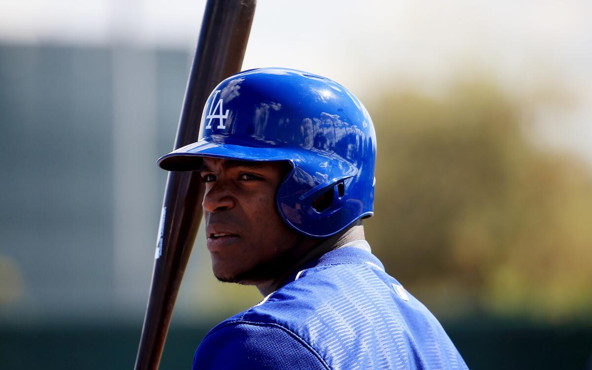 Dodgers outfielder Yasiel Puig takes batting practice during spring training at Camelback Ranch in Phoenix on March 3.