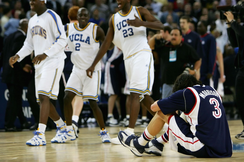 Gonzaga's Adam Morrison hangs his head after losing to UCLA in the NCAA tournament March 23, 2006, in Oakland.