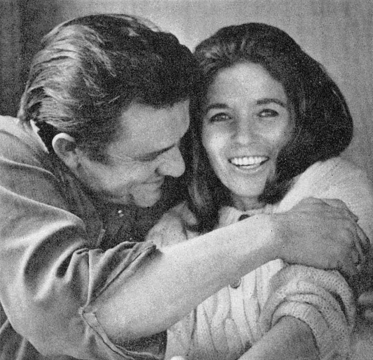 An archival photo of June Carter Cash and Johnny Cash.