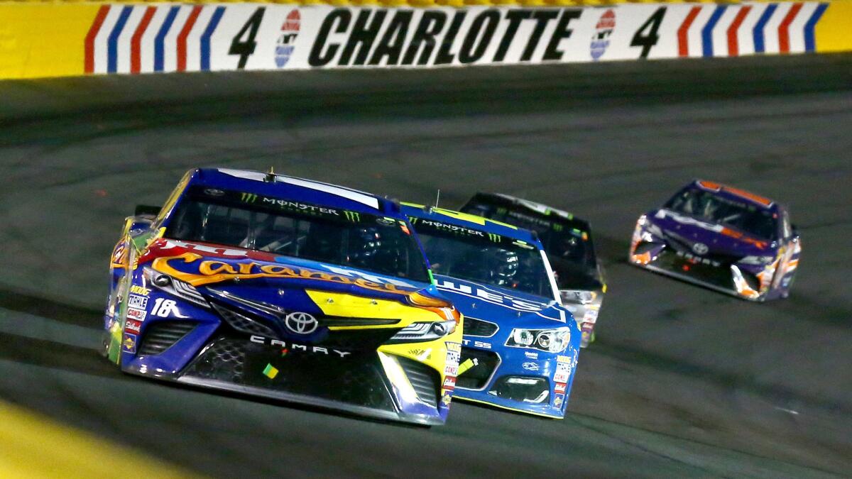 NASCAR driver Kyle Busch comes out of turn during the Monster Energy All-Star race at Charlotte Motor Speedway on Saturday night.