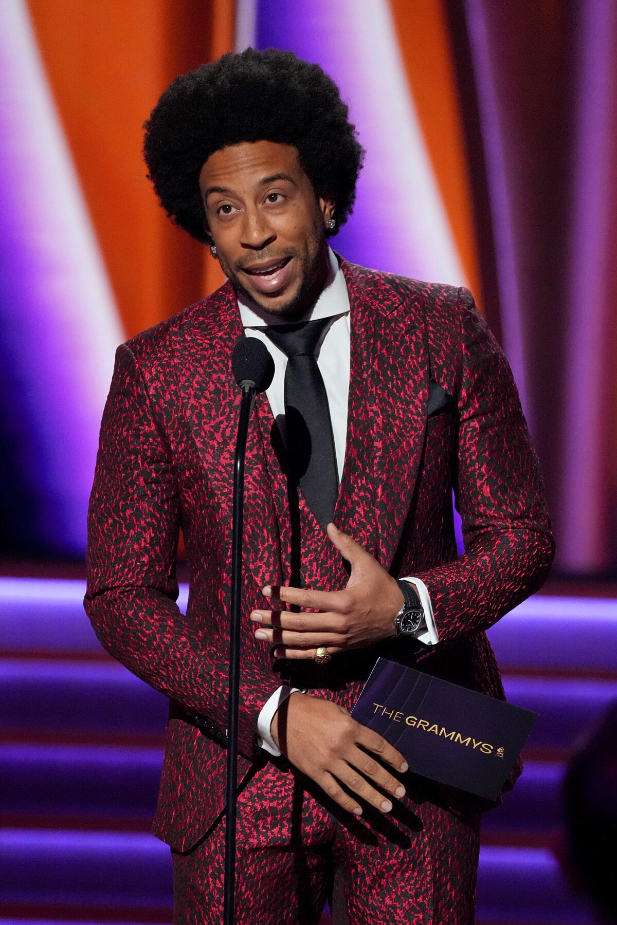 Ludacris speaks onstage during the 64th Grammy Awards.