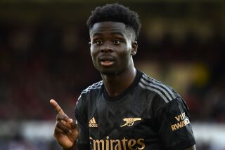 Arsenal's Bukayo Saka gestures during the English Premier League soccer match between Nottingham Forest and Arsenal at City ground in Nottingham, England, Saturday, May 20, 2023. (AP Photo/Rui Vieira)