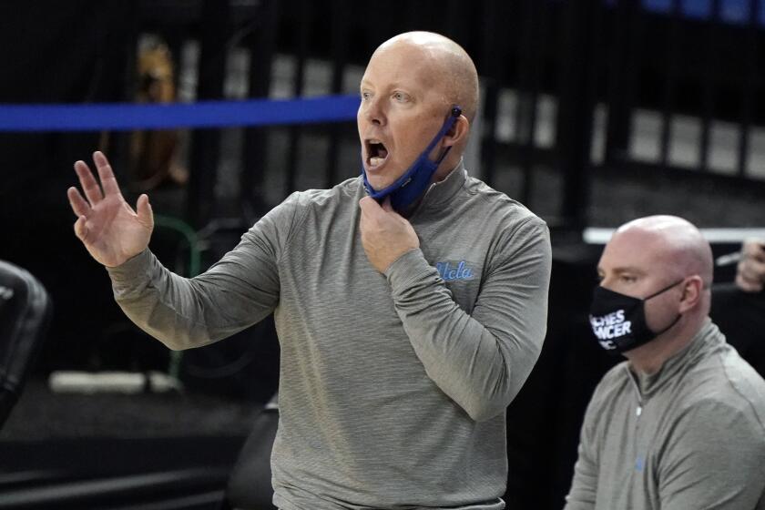 UCLA head coach Mick Cronin yells from the bench during the second half of an NCAA college basketball game against Oregon State Saturday, Jan. 30, 2021, in Los Angeles. (AP Photo/Marcio Jose Sanchez)
