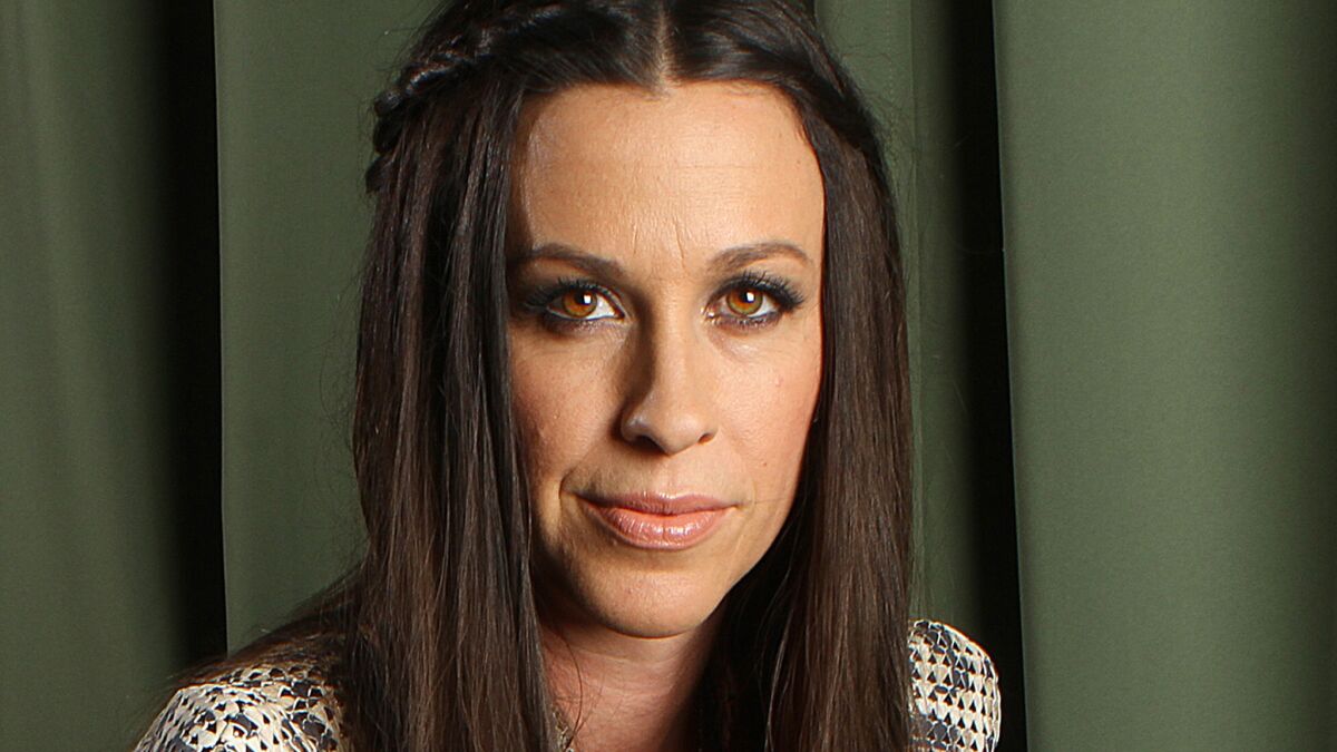 Alanis Morissette's former business manager has pleaded guilty to federal wire-fraud and tax charges.