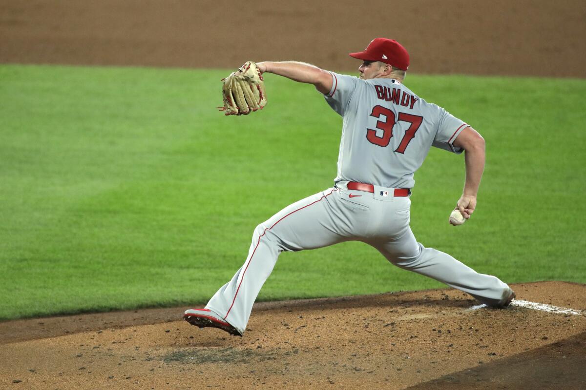 Angels starter Dylan Bundy delivers a pitch against the Seattle Mariners in the third inning Thursday.