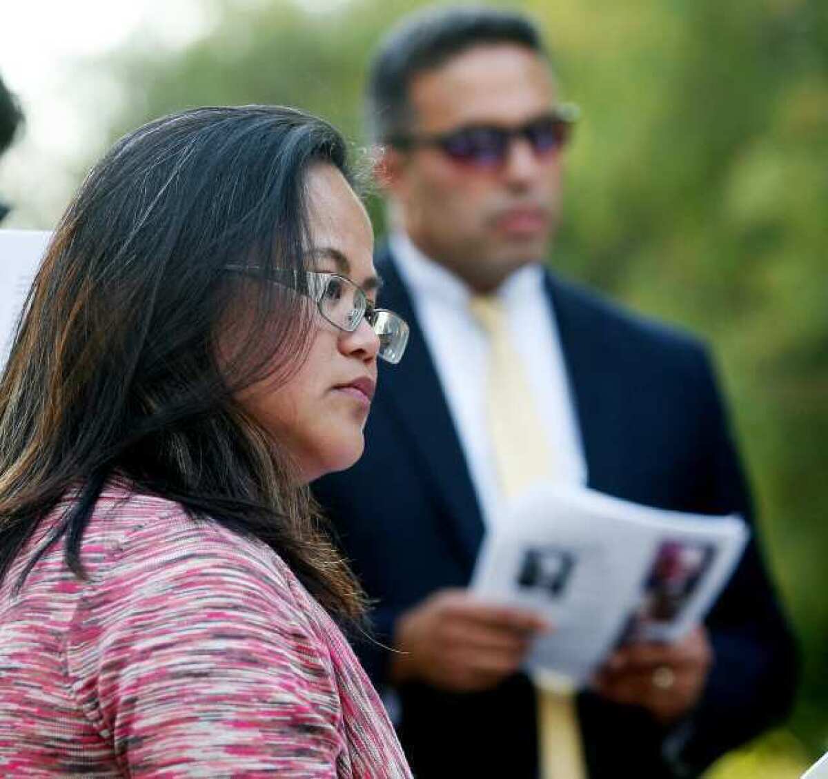 Thea Ivens, wife of Stephen Ivens, at a prayer vigil for her missing FBI agent husband at McCambridge Park in Burbank.