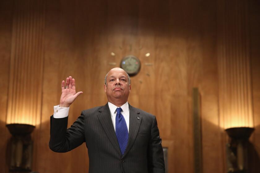 A Senate committee voted overwhelming Wednesday to send the nomination of Jeh Johnson as secretary of Homeland Security to the full Senate. Above, Johnson is sworn in to testify at his confirmation hearing.