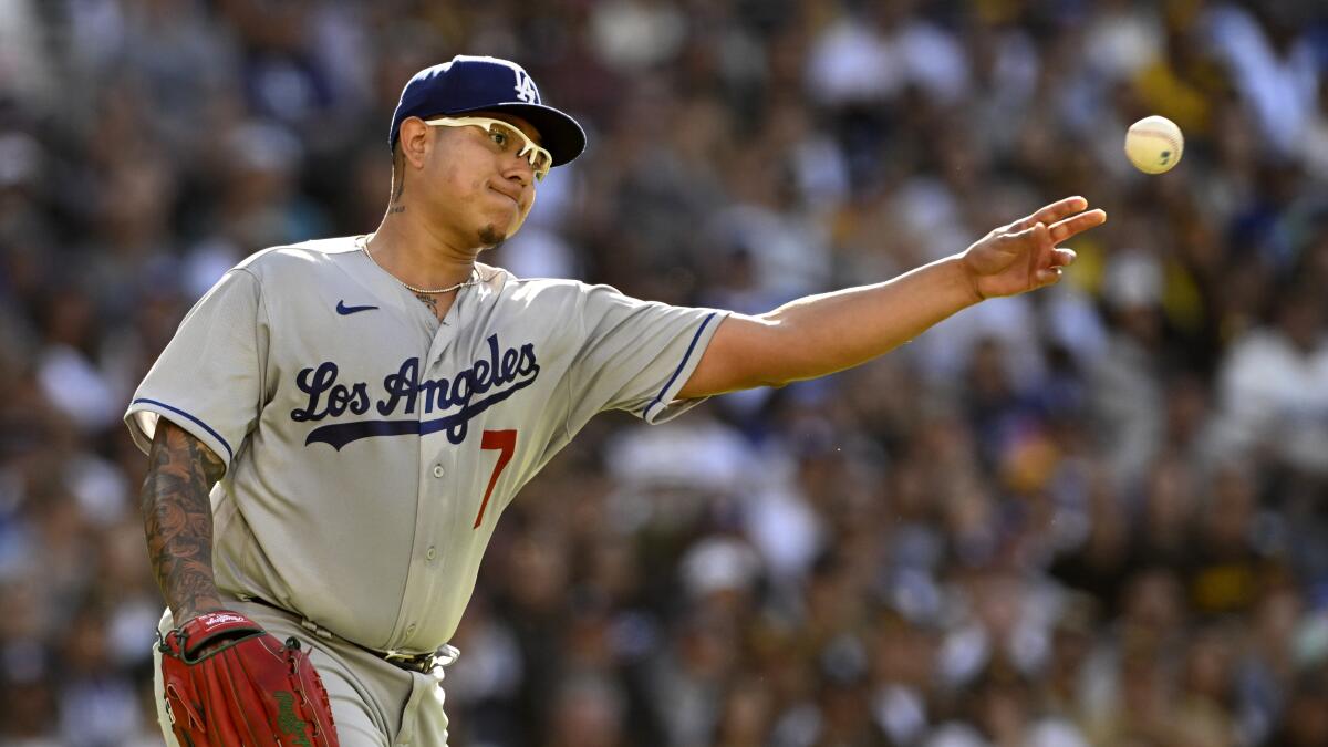 Los Angeles Dodgers second basemen Miguel Vargas (17) throws the ball to  first base during a MLB regular season game between the Los Angeles Dodgers  and New York Mets, Tuesday, April 19