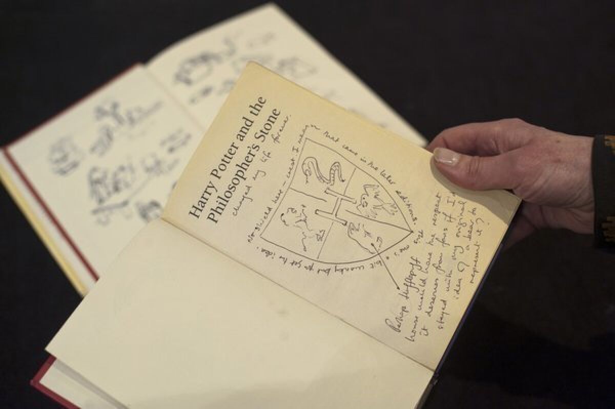 J.K. Rowling's notes in the first edition of "Harry Potter and the Philosopher's Stone," as it was published in England, being auctioned by the writers' rights charity PEN.