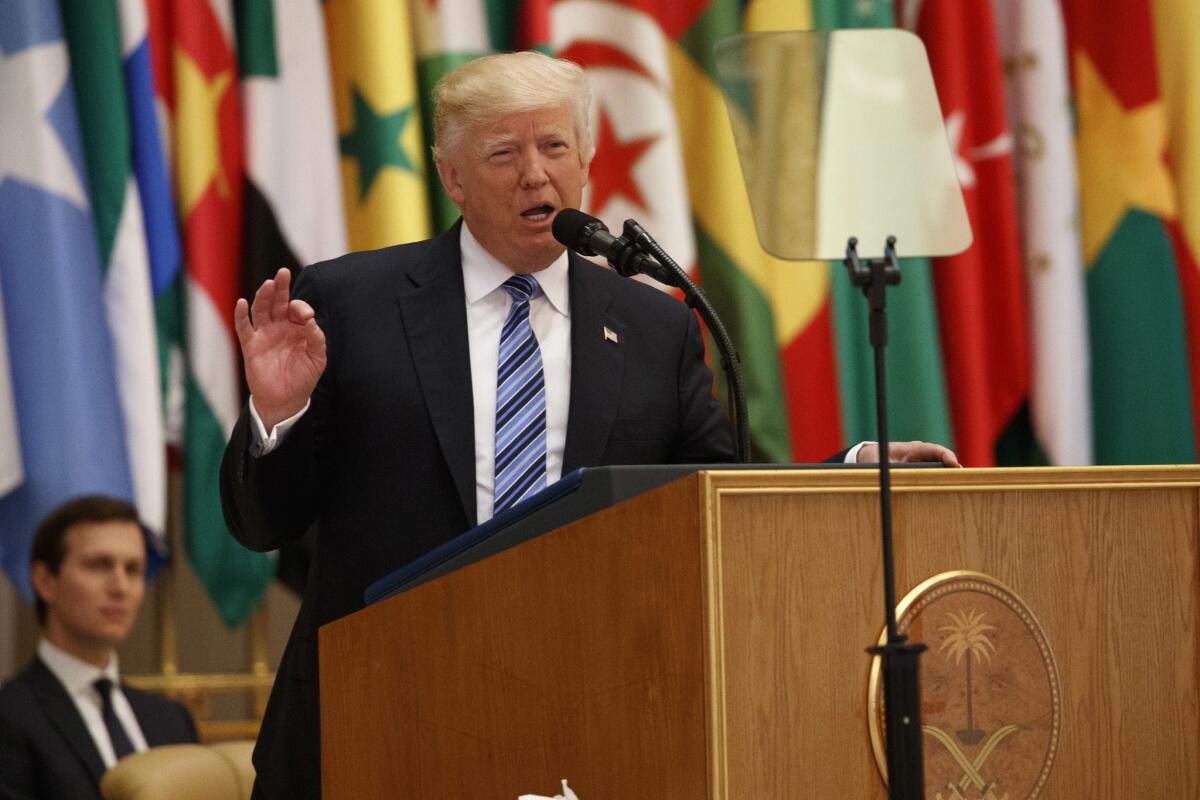 President Trump delivers a speech to the Arab Islamic American Summit at the King Abdulaziz Conference Center on Sunday in Riyadh, Saudi Arabia.