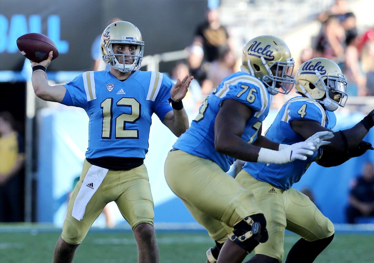 UCLA quarterback Mike Fafaul throws downfield against Utah in the fourth quarter.